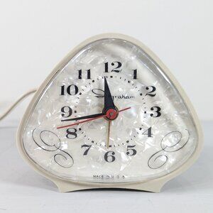 Vintage 1950s Triangular Ingraham electric alarm clock (wired) White pearl face